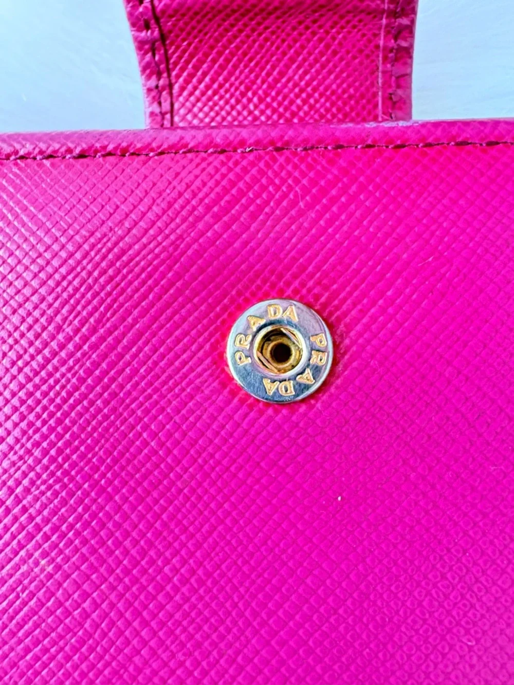 PRADA fuchsia Saffiano Leather Compact Wallet‎